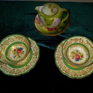 China tea pot and cups and saucers. Made in Bavaria and Germany. Antique